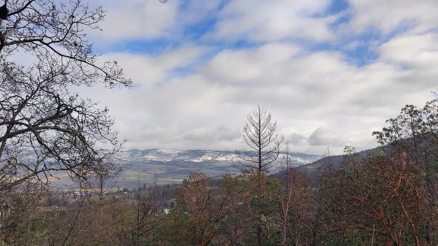 View over the Rogue Valley with a dusting of snow on the hills